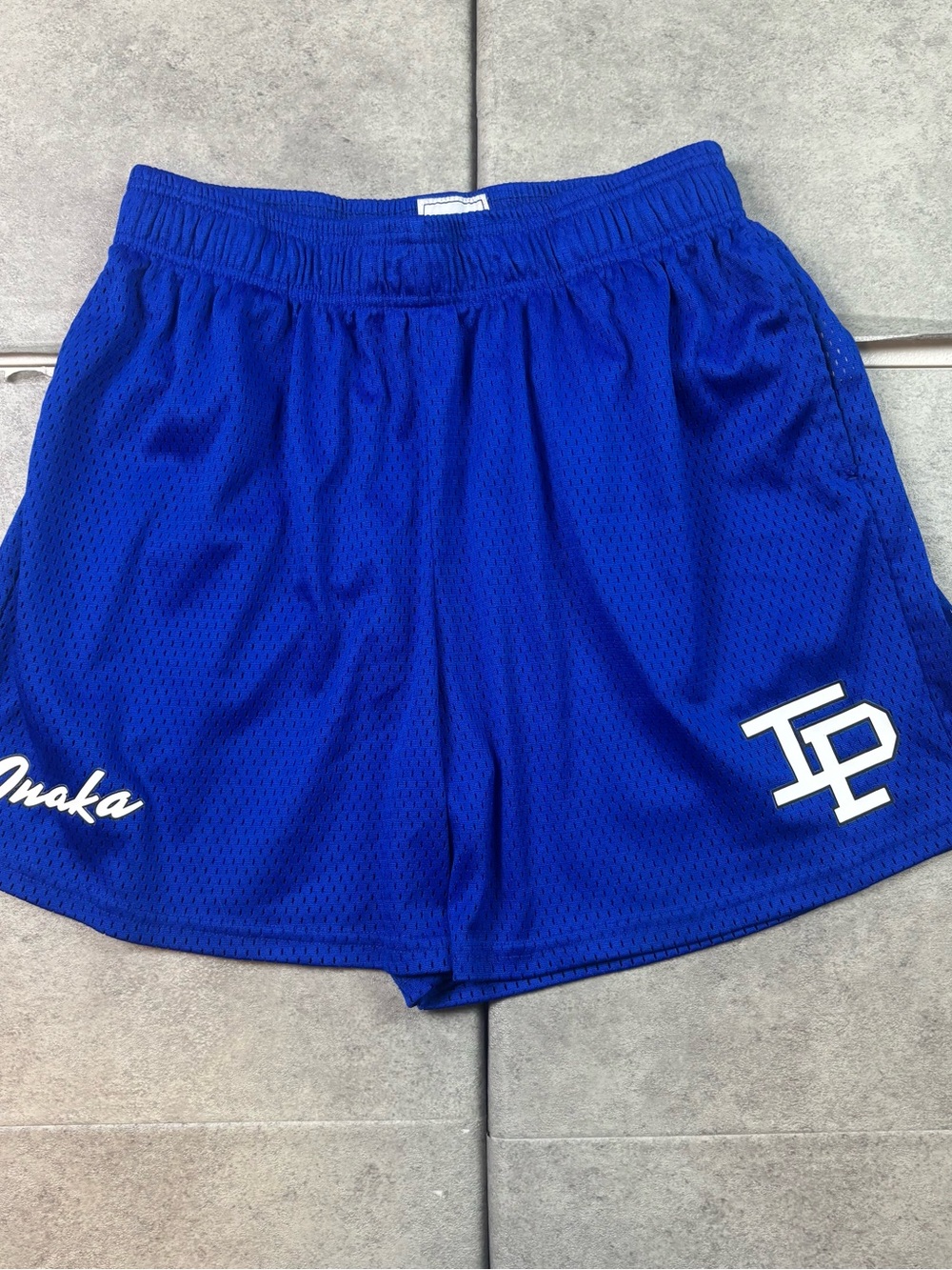 Inaka Power blue mesh athletic shorts